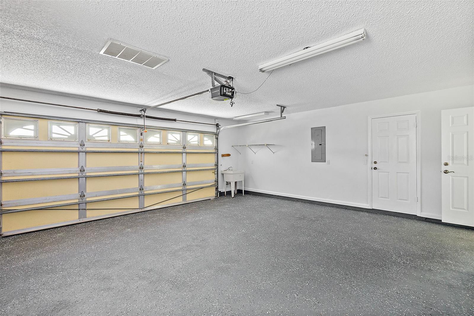 2 car garage with epoxy floor & Sink