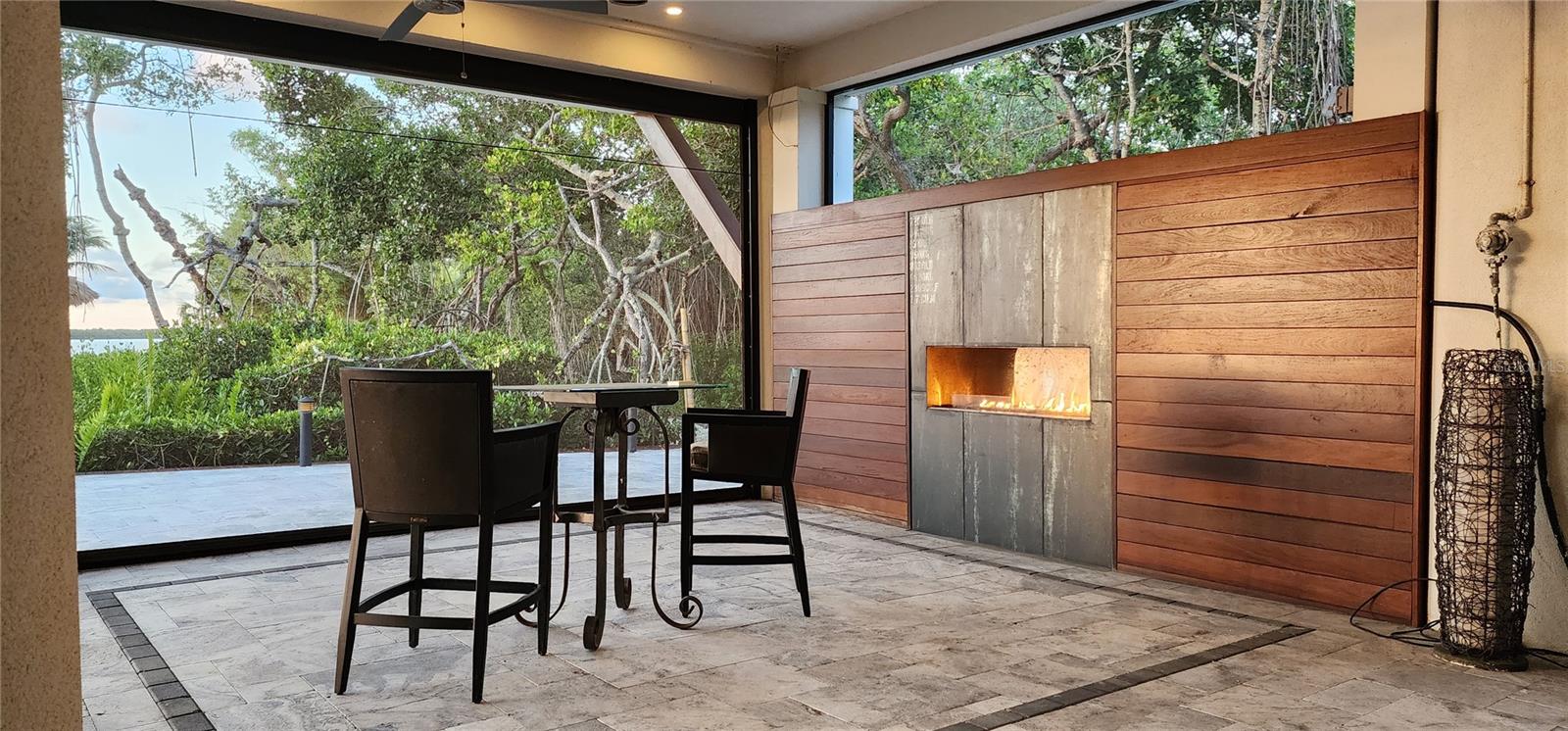 Propane gas-powered fireplace - under house dining area