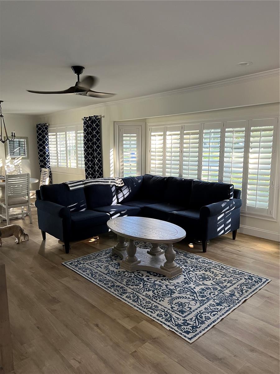 Large windows in the living area have Beautiful Plantation Shutters allowing complete control of how much natural light you want in the room!