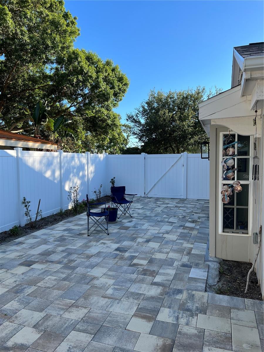 Paved back patio to enjoy some outdoor grilling and activities.