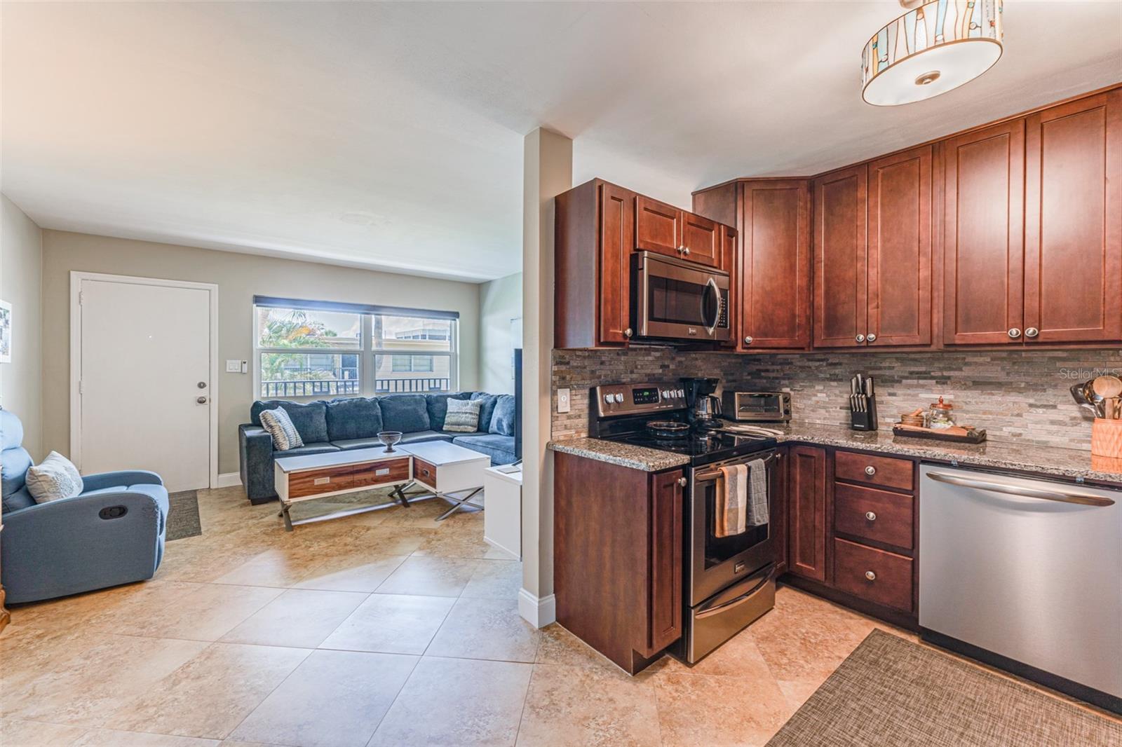 Upgraded appliances &amp; fixtures through kitchen