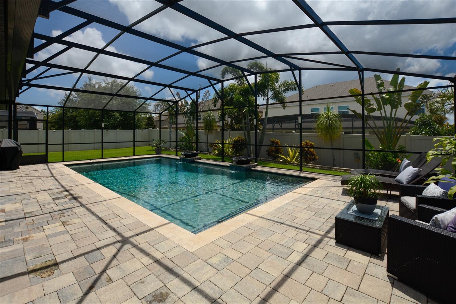 WOW!! What a Pool featuring Pebble Teck Finish, 2 Benches, Stairs, 2 Water Features, Heater and it's SALT too. The pool depth is 3' to 7'