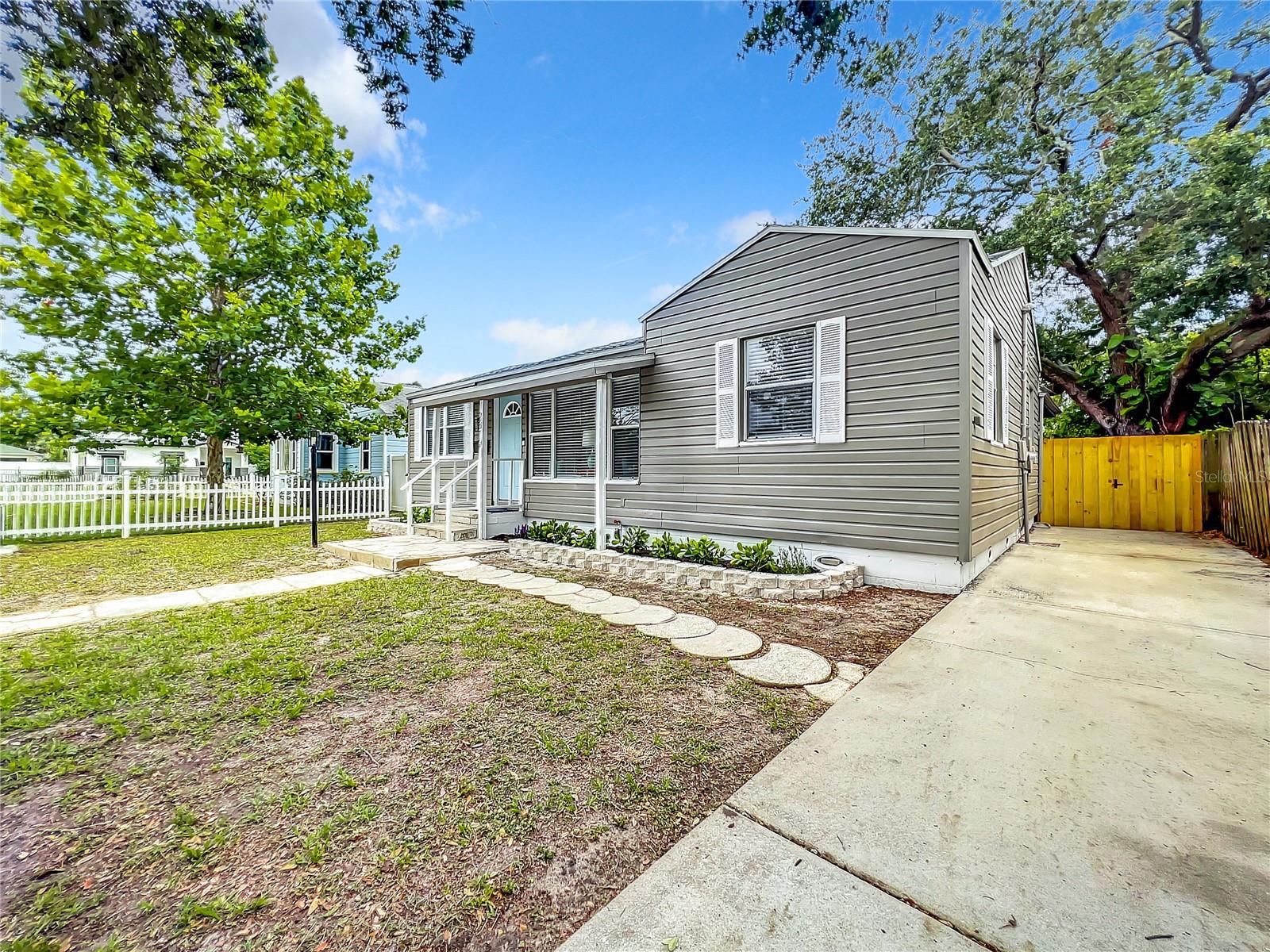 Front Exterior with Gate to Backyard