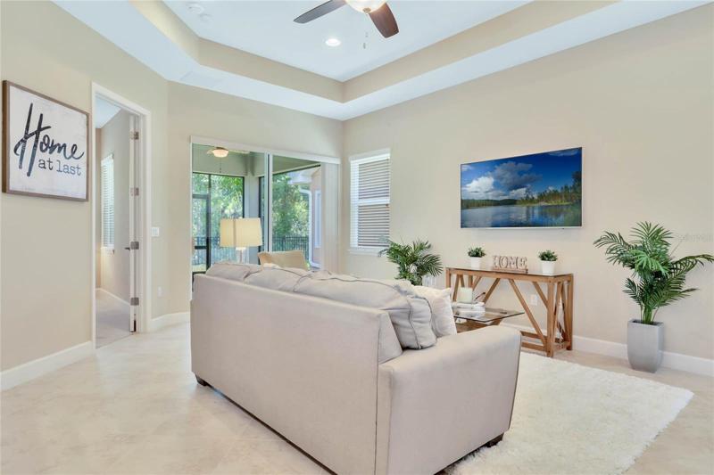 Great Room w/ wall mounted flat screen TV