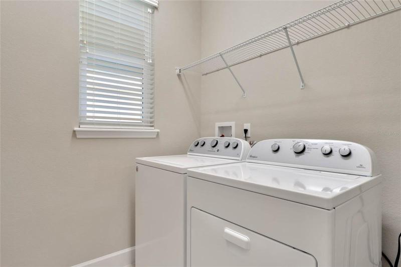 Utility Room w/ washer & dryer