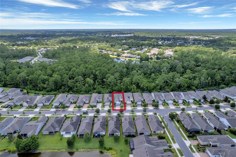 Aerial view of home's location & surrounding area
