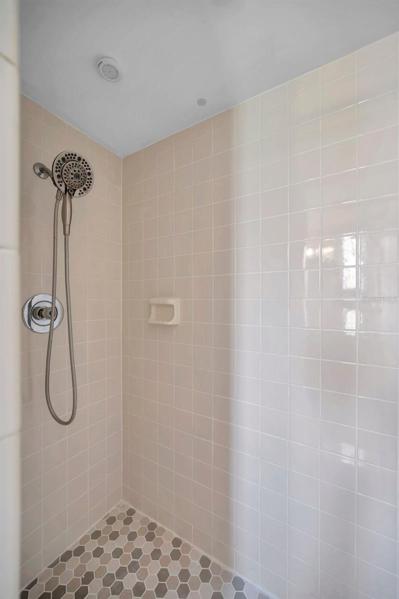 Full Ensuite Bathroom in the Primary Bedroom with large Walk-In Shower, Large Vanity, lots of natural light, renovated Cabinets, Countertops, Back Splash, Facuets, etc.