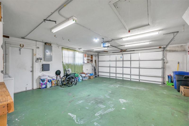 Washer and Dryer included and located in the Double Car Garage with a Utility Tub and cabinets for storage.