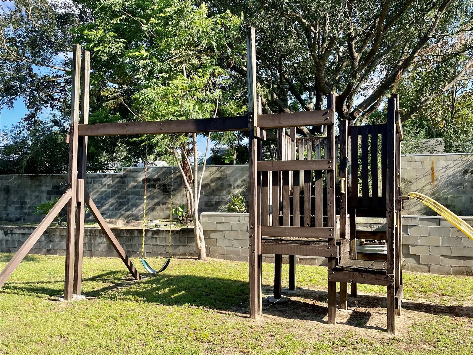 swing set and jungle gym in good shape