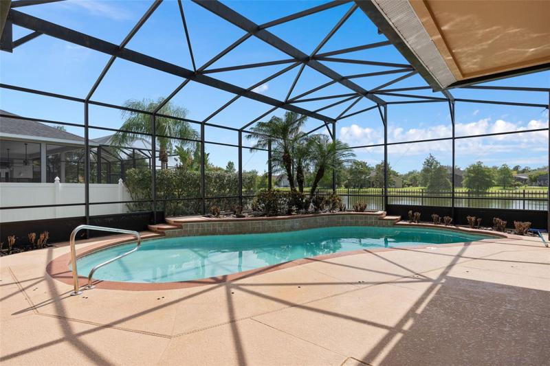 Pool with waterfront view