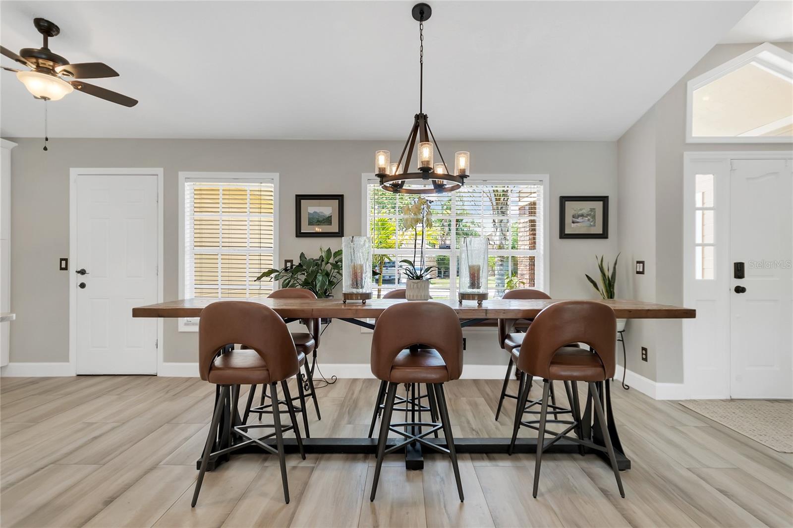 As you enter the large open space, which combines the family room, dining area, and kitchen, you'll be delighted by the possibilities it offers.