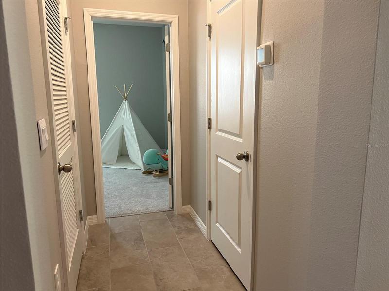 Hallway to Bedroom 3 and Laundry