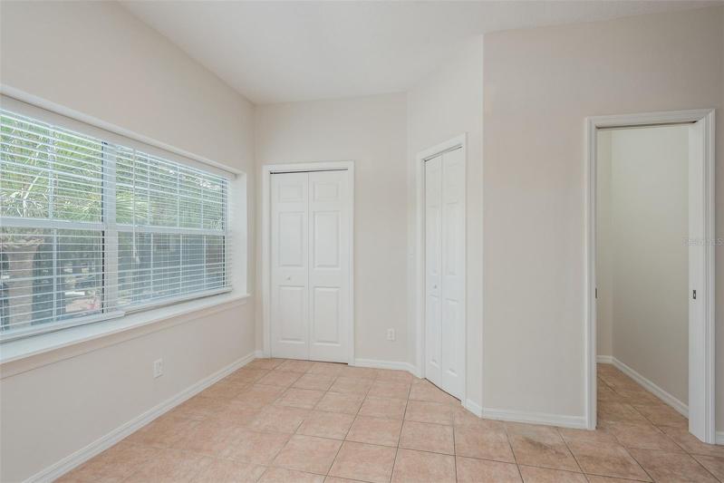 Kitchen- Doors are to the laundry room and a pantry- open door is to a 1/2 bath