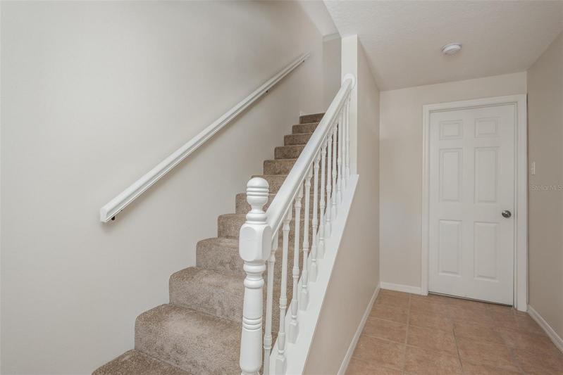 inside front entry-door is to the garage
