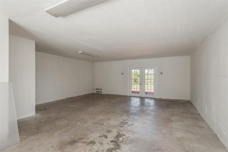 garage- closet on left, plenty of room for all of your vehicles, boats-you name it
