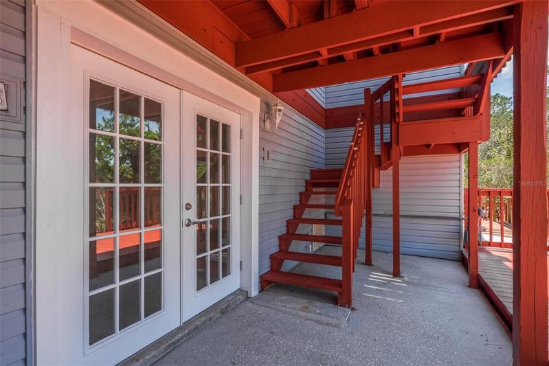 garage level doors- new deck on right