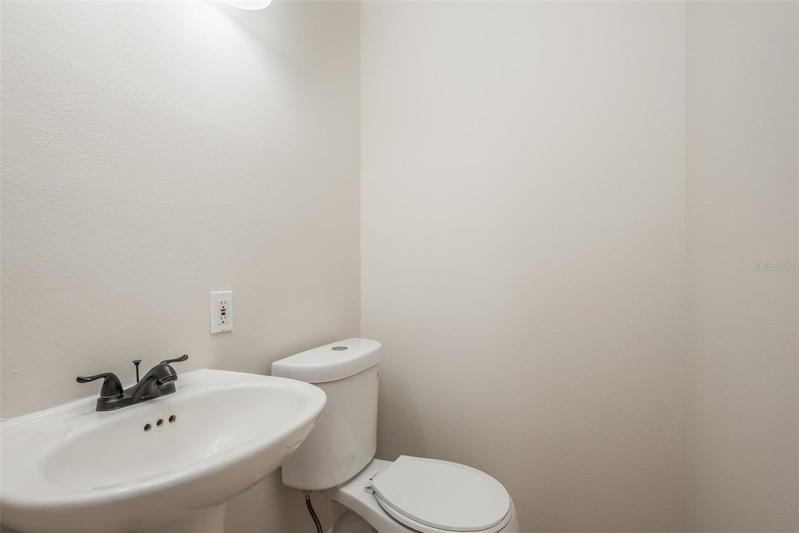 1/2 bath off kitchen