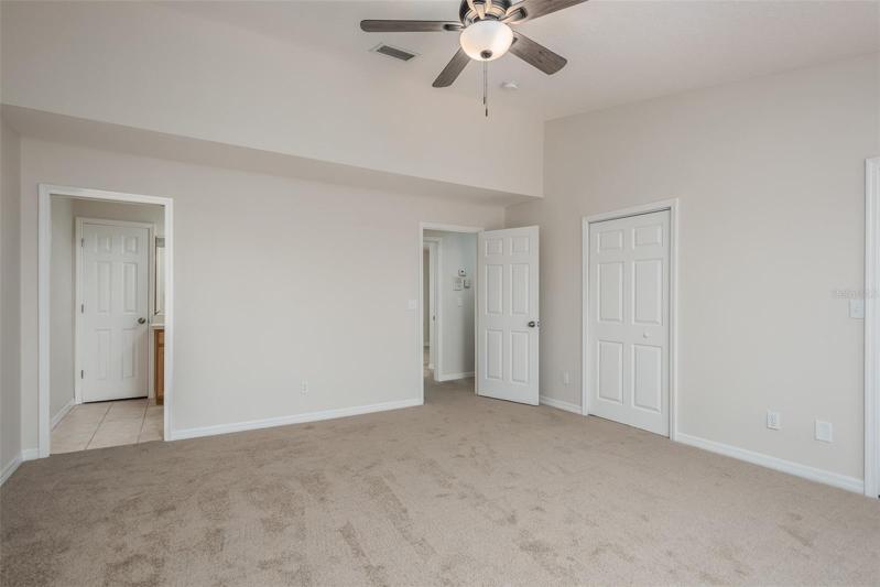 Primary bedroom with ensuite bathroom