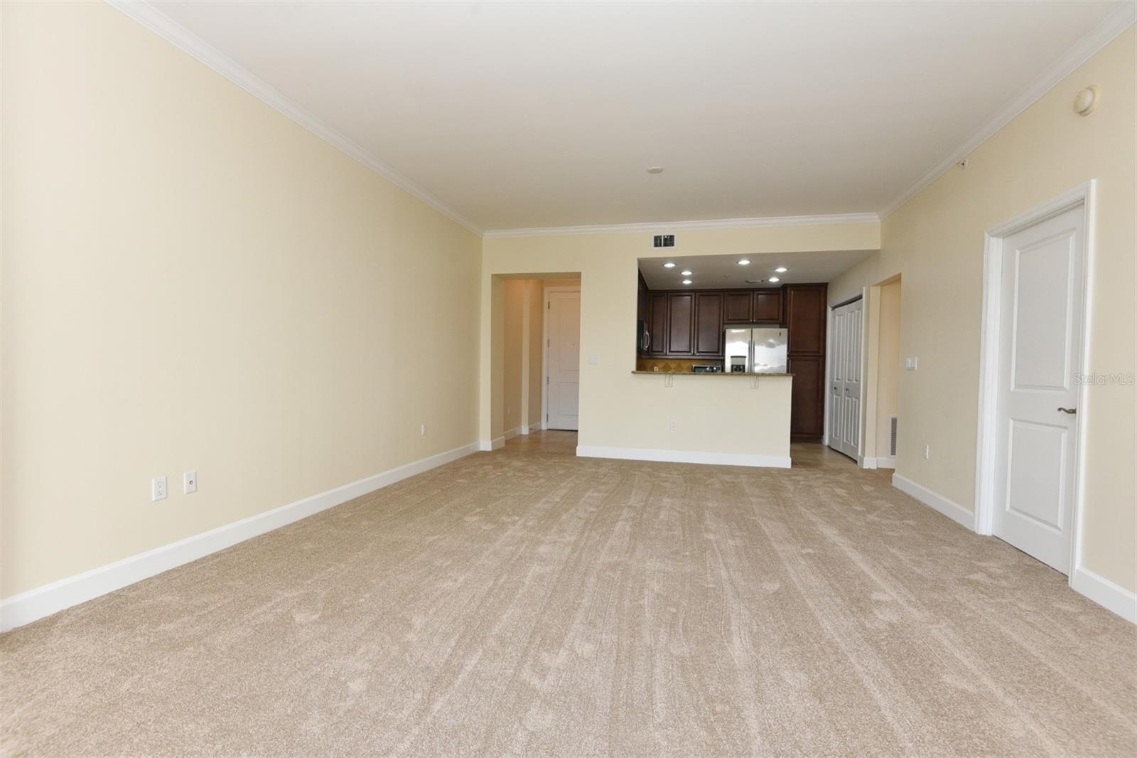 Dining Area with Kitchen  in Background