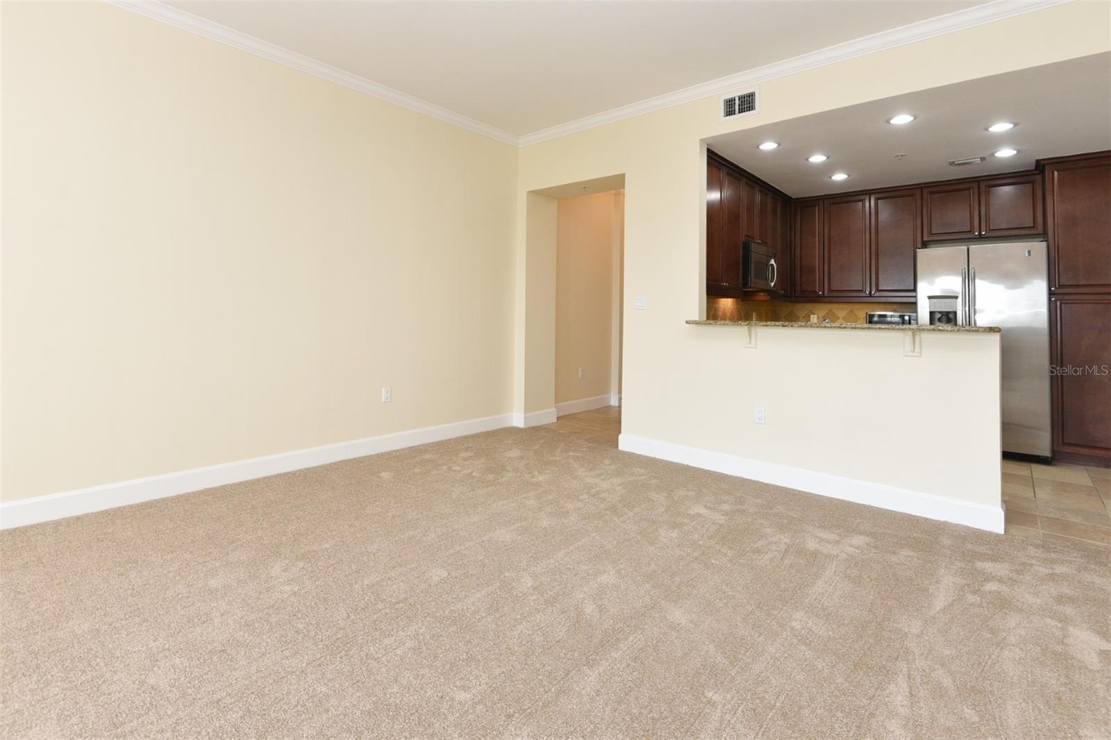 Dining Area with Kitchen  in Background