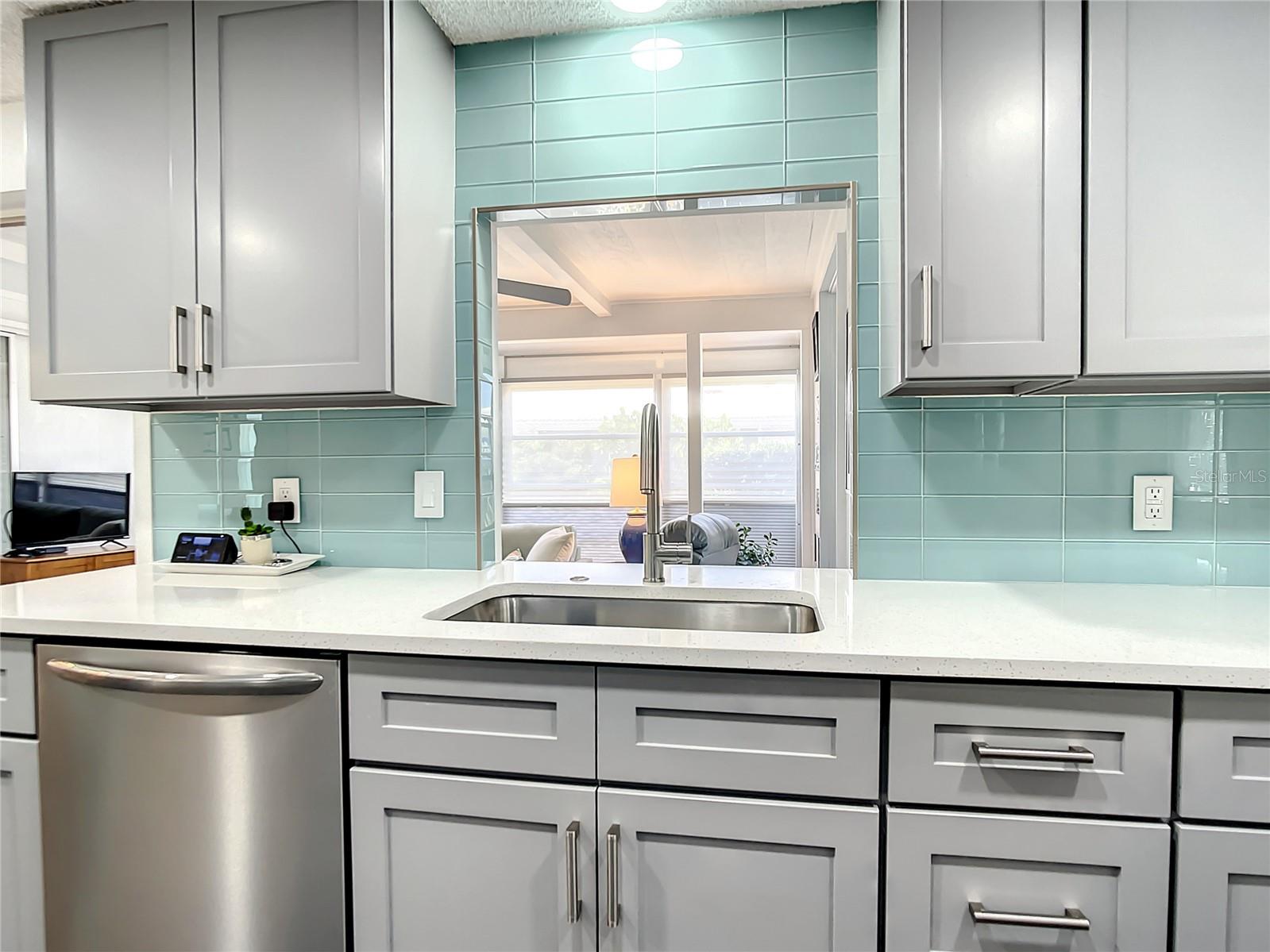 Farmhouse Sink with convenient pass-through window.