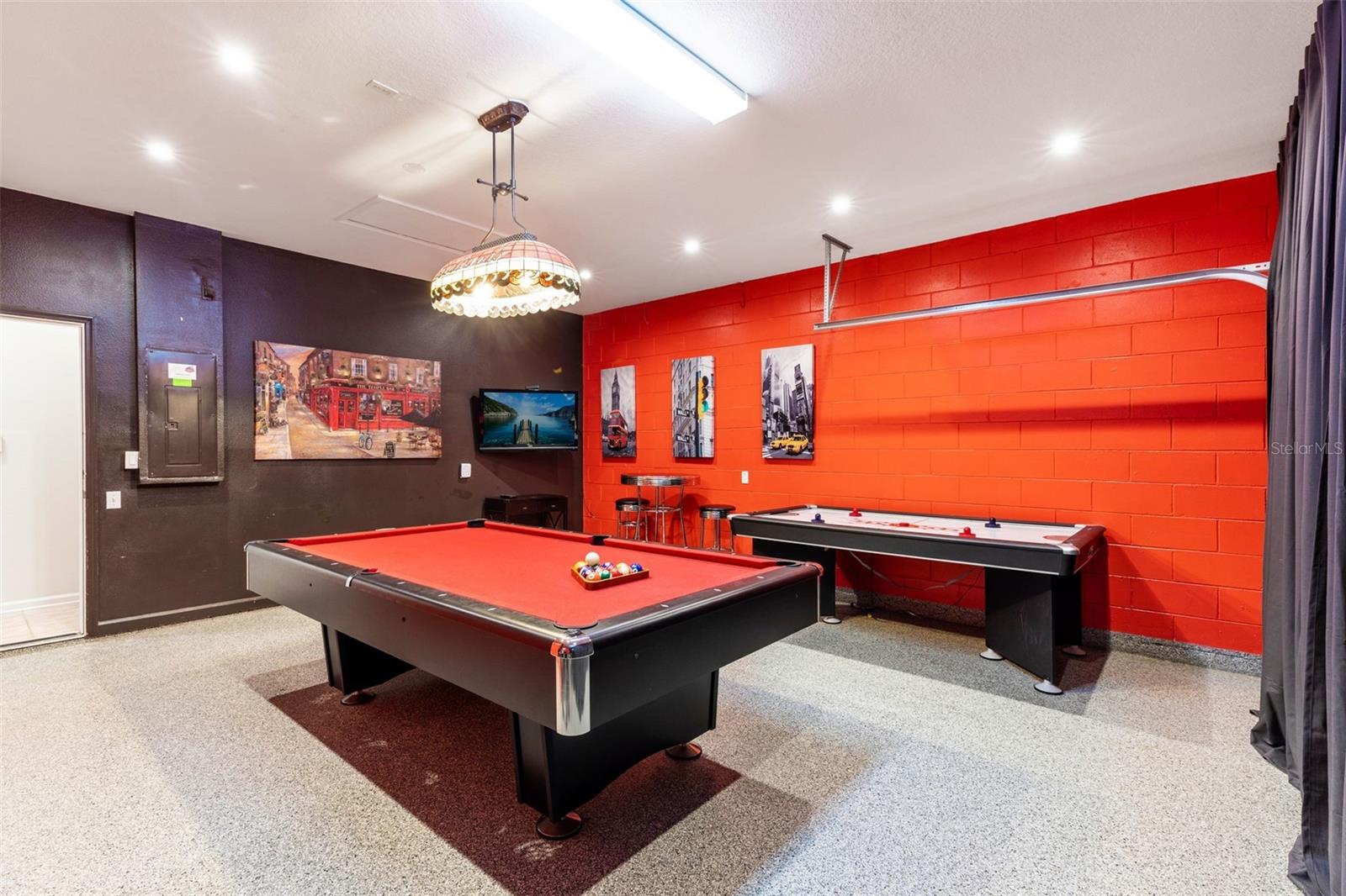Game room with pool table and air hockey