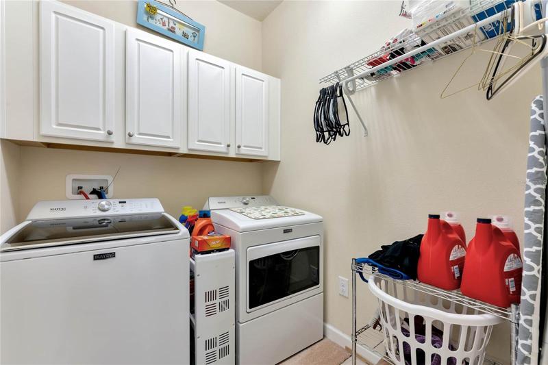Laundry Room with Washer & Dryer & Additional Cabinetry