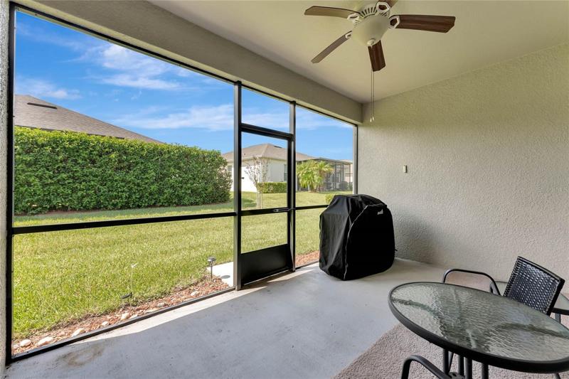 Screened Lanai offers a Ceiling Fan