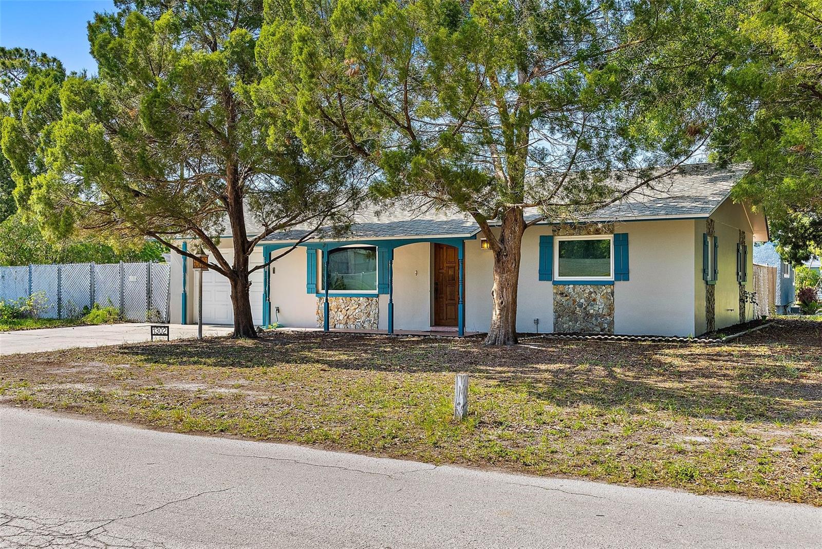 Large corner lot with desirable alley access.