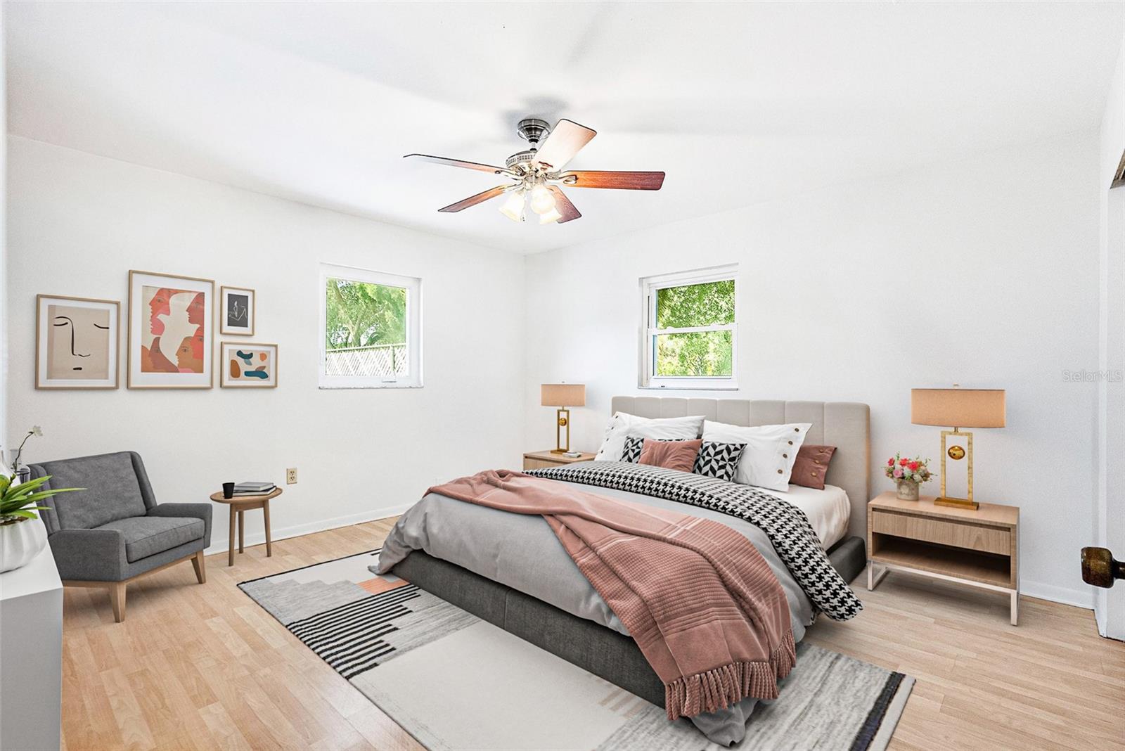 Primary bedroom has plenty of space for a king-sized bed.