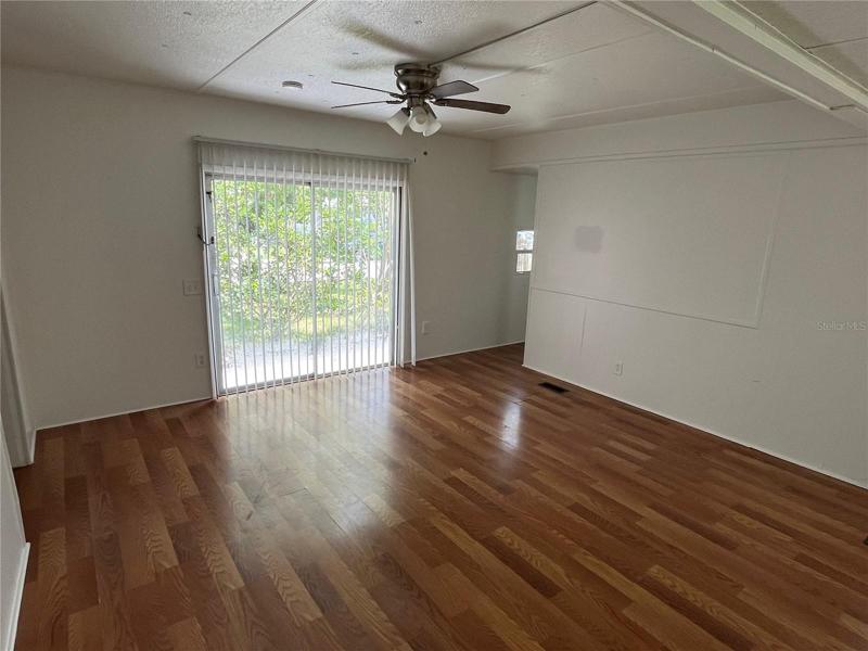 Living Room with Sliding Door to Front Yard