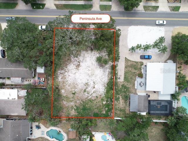 Note the beautiful, mature trees along Peninsula Ave offering privacy but are located outside build area.
