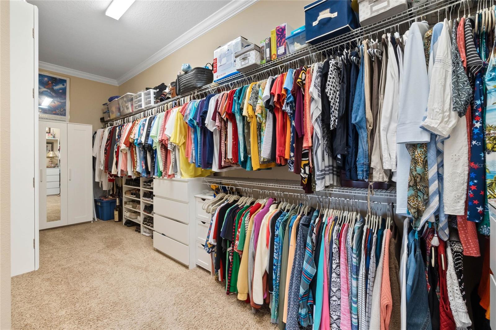Large master closet with lots of storage.