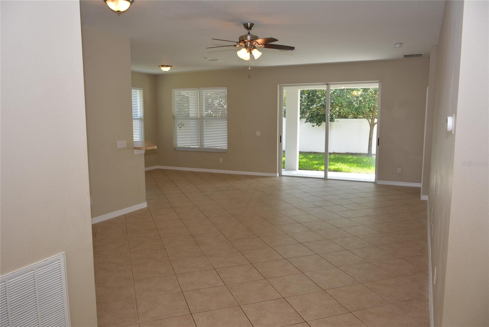 Foyer includes line-of-sight to the covered lanai and backyard
