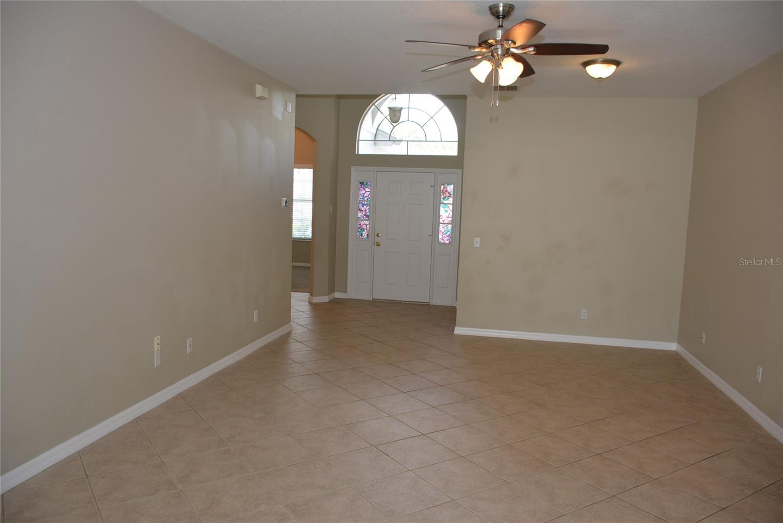 Tile floors in all the living and wet areas with nine foot ceilings throughout the home