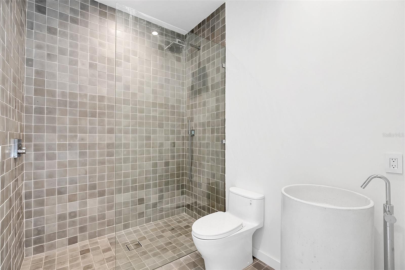 Outdoor full bathroom perfect for after pool fun 11835 Lake Butler Blvd, Windermere, FL 34786