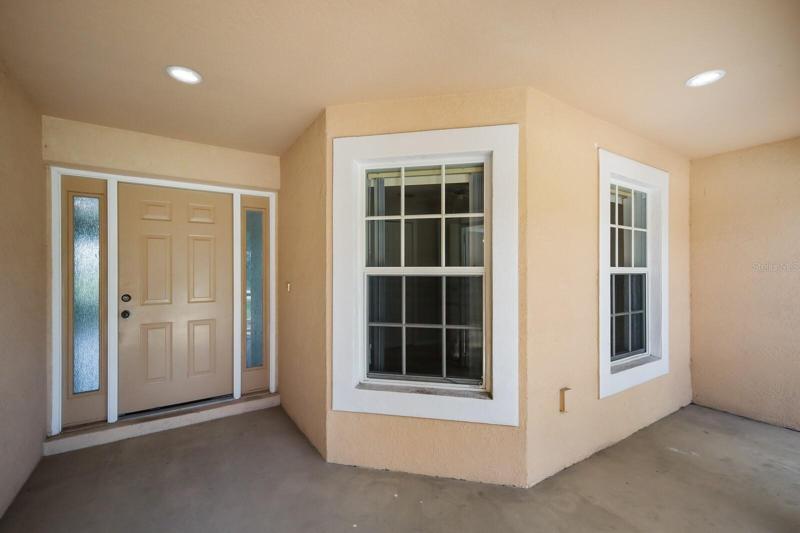 Front door inside the screened in porch