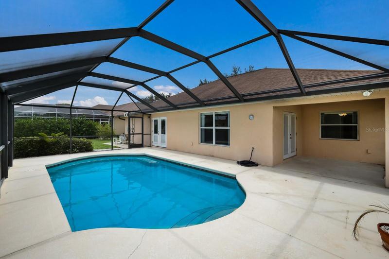 Heated pool and covered back patio for FL living