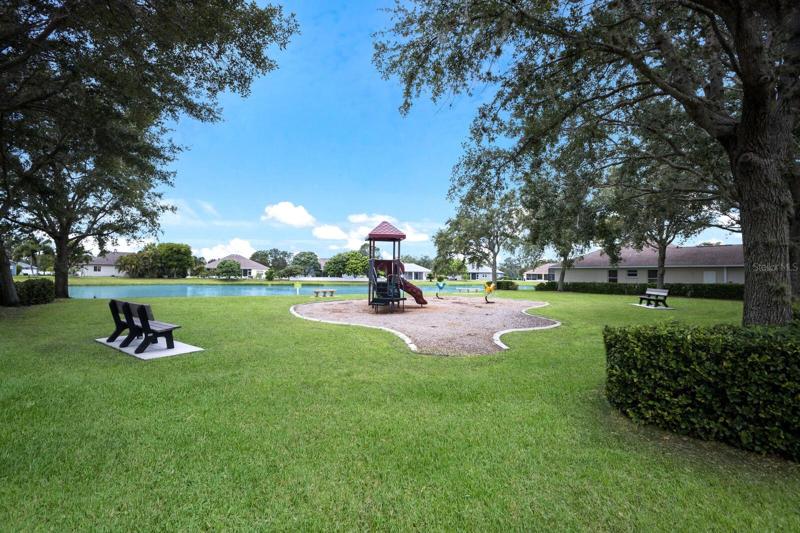 Kids play and adults relax by the lake!
