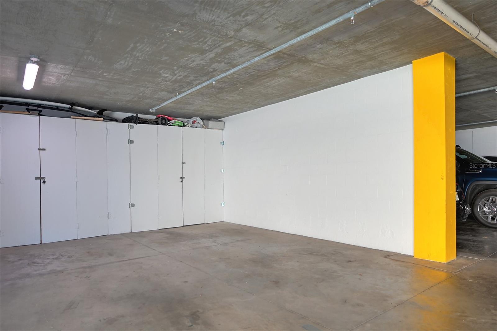 Under Building Parking Space w/ Storage