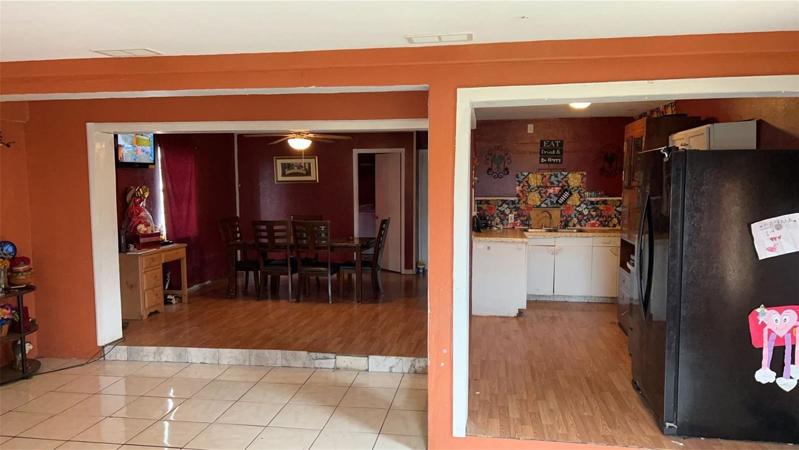 View of dining room and kitchen from the family room