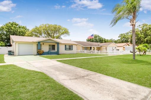 LARGO - Be sure to put this PRISTINE and BEAUTIFULLY remodeled 2 bedroom, 1 bath, 1 car garage BLOCK home nestled in a small and quite neighborhood with a shed and fenced in yard on your list to see!