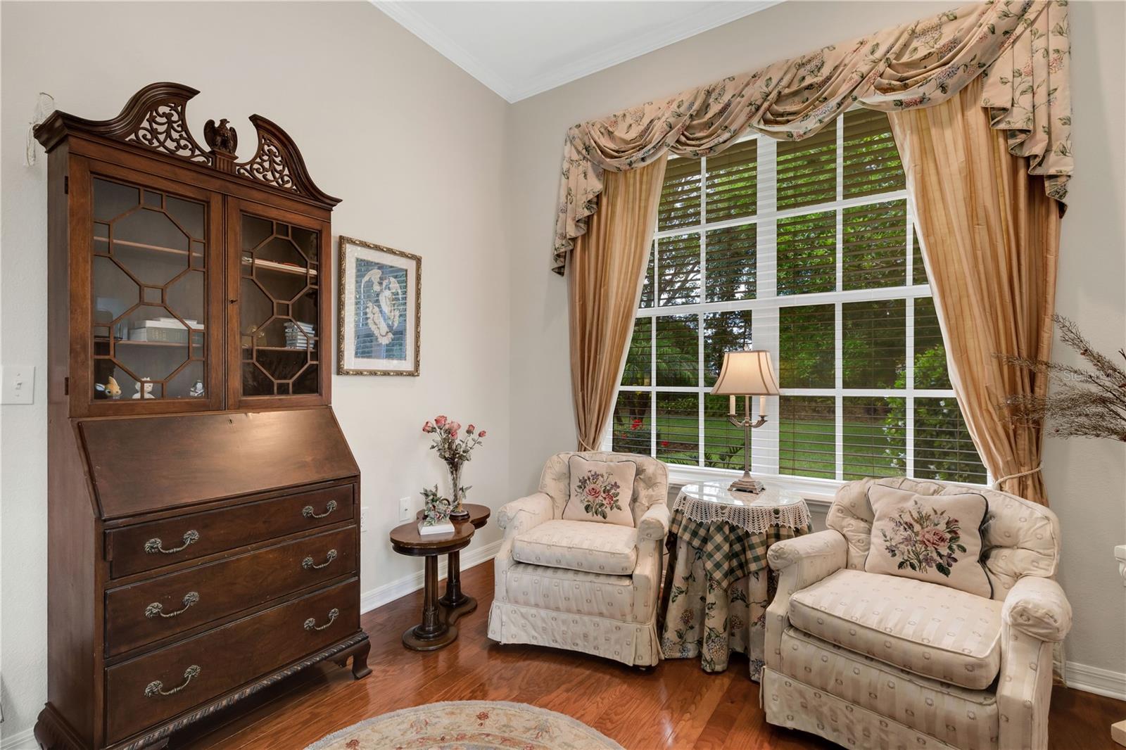 with a view of nature beyond the large picture windows.