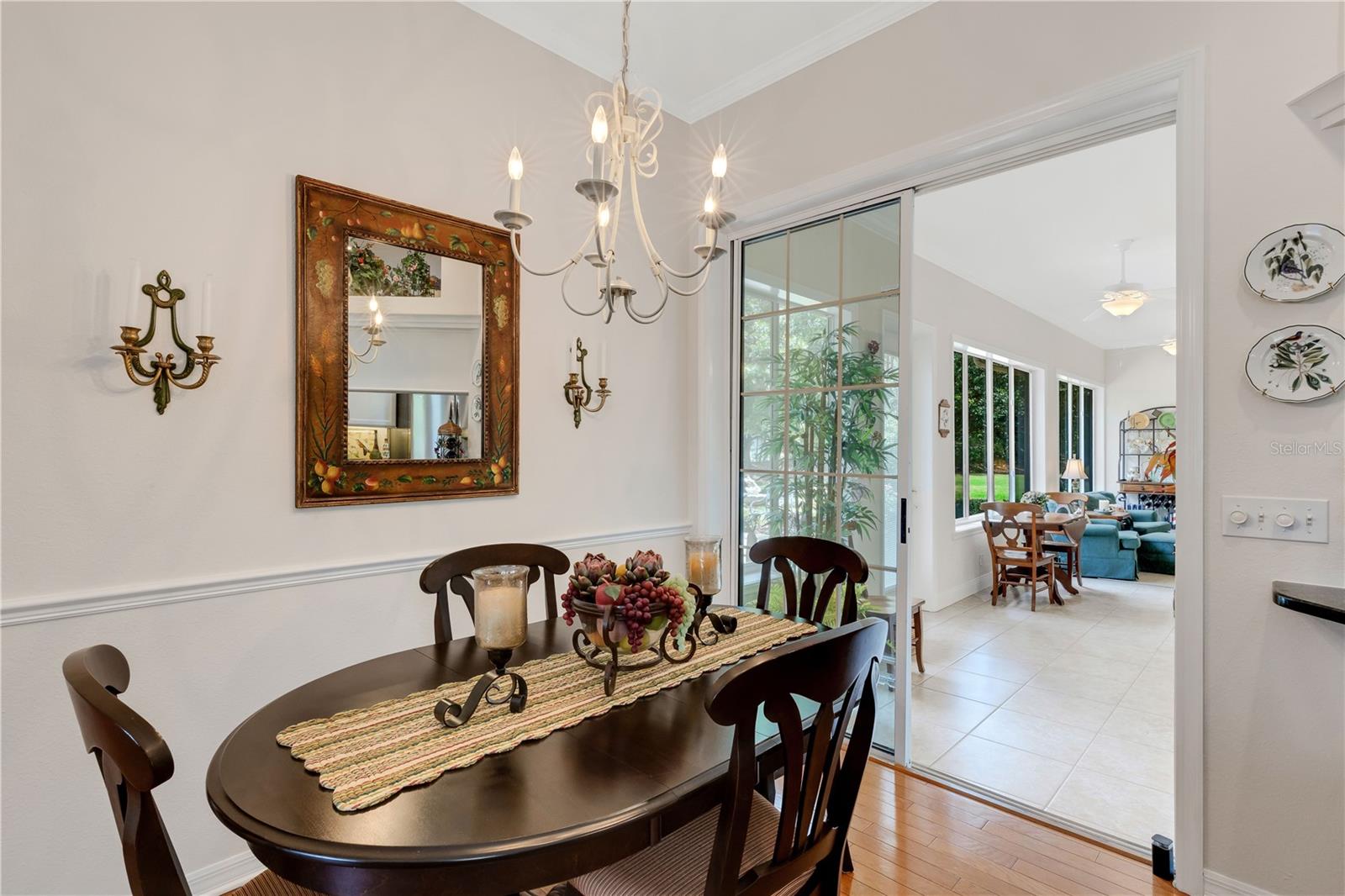opening to the glass enclosed air-conditioned Florida room.