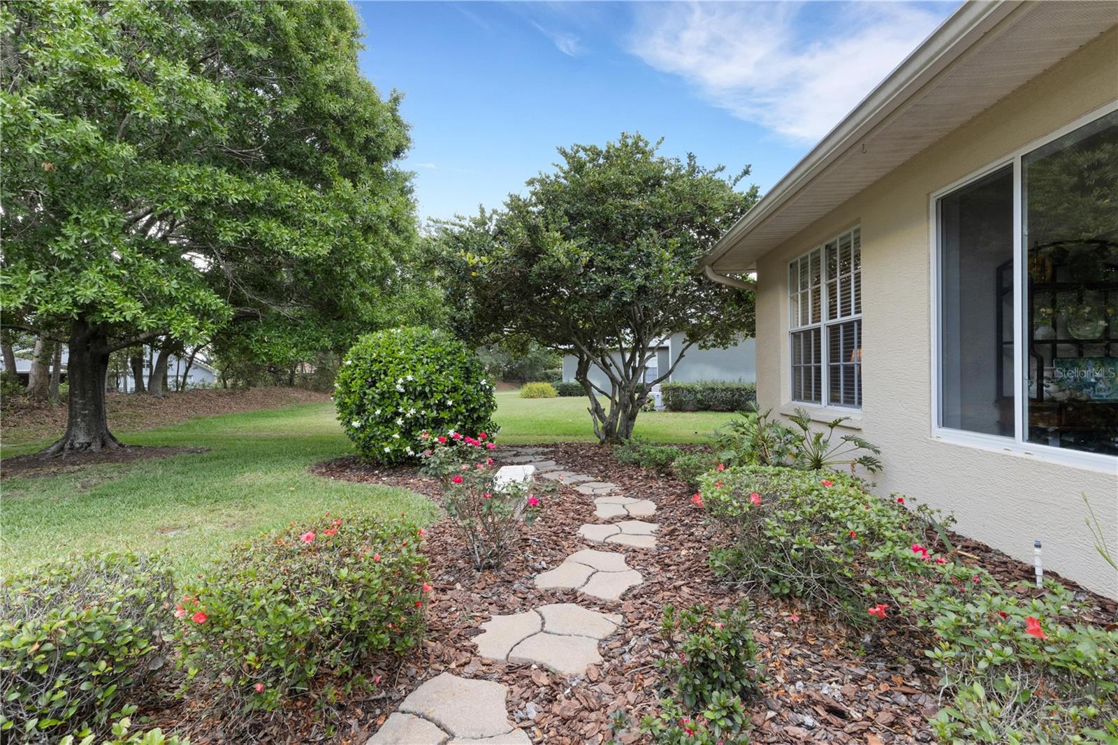 landscaped and hardscaping to provide pathways around the property