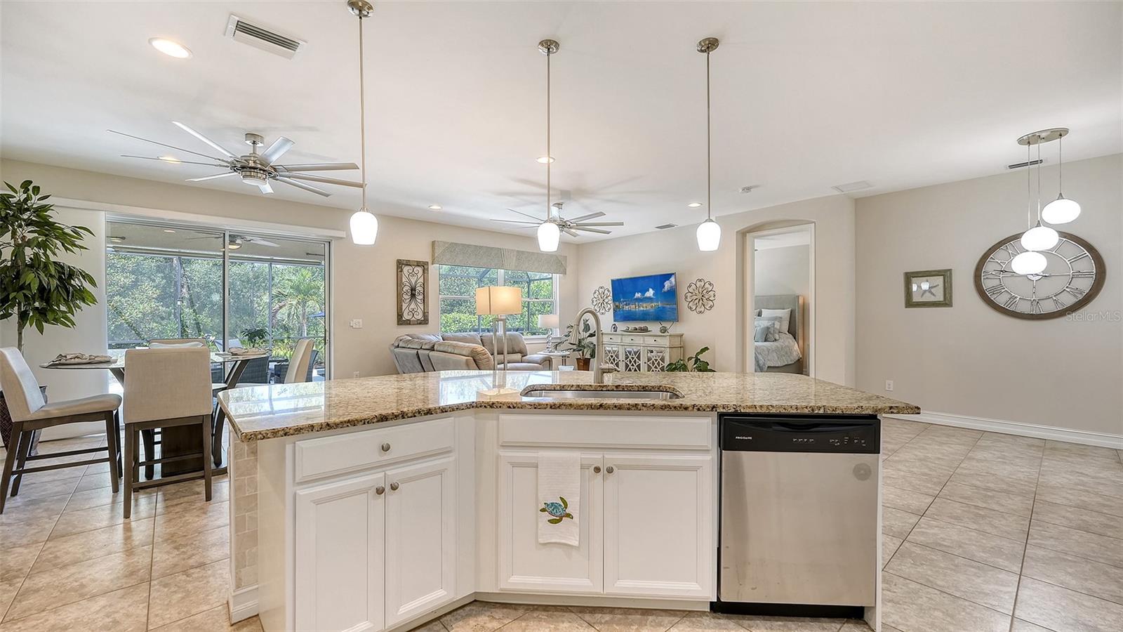 White wood cabinets, granite counters