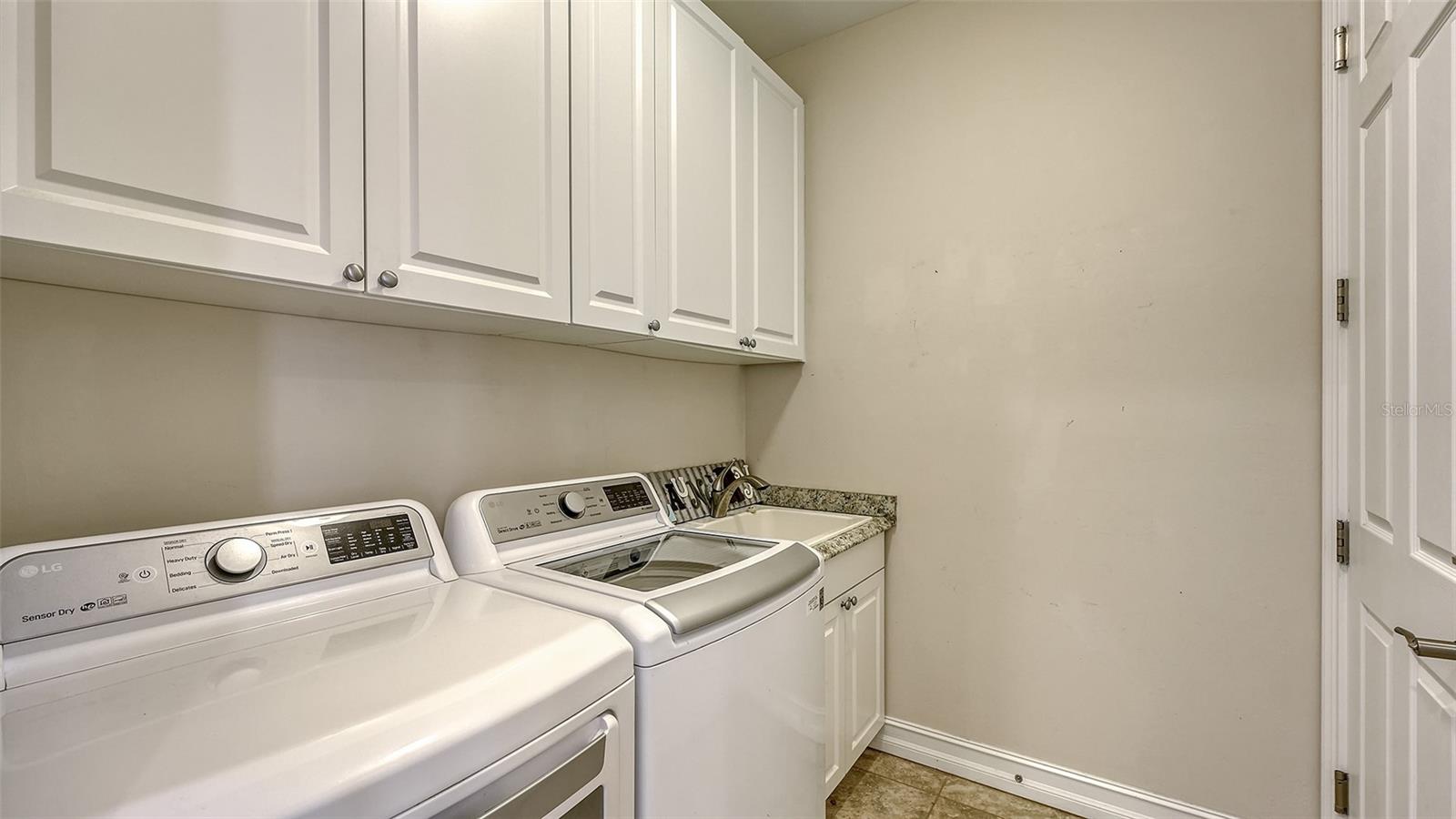 Laundry room with water tub