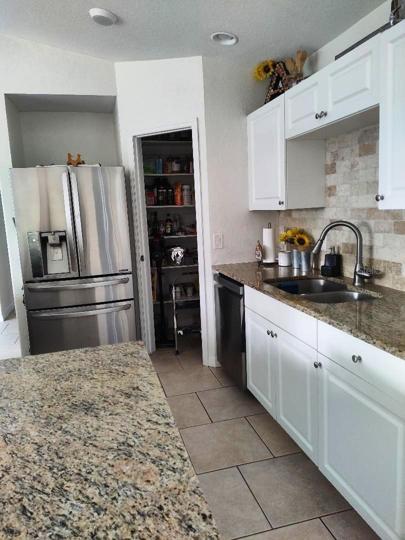 Clean, neutral and popular kitchen designed by a chef.