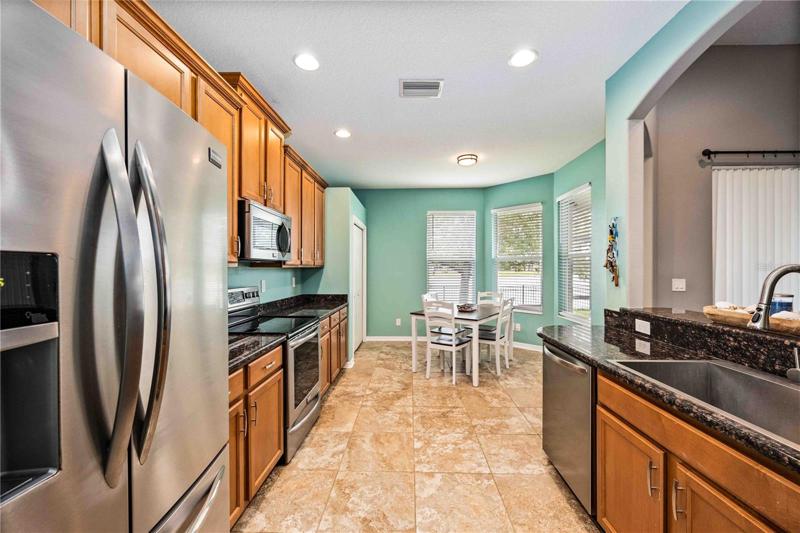 Efficient culinary hub, ample storage, top-tier appliances.