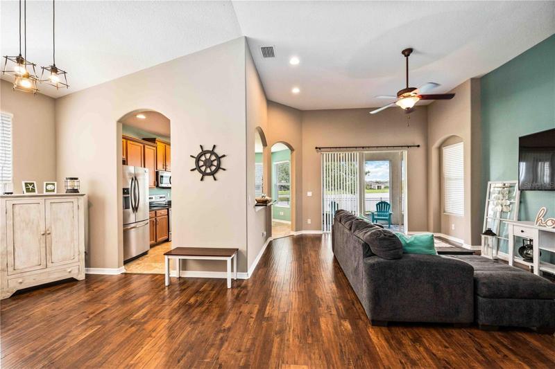 Open-concept kitchen, seamless flow to living/dining.